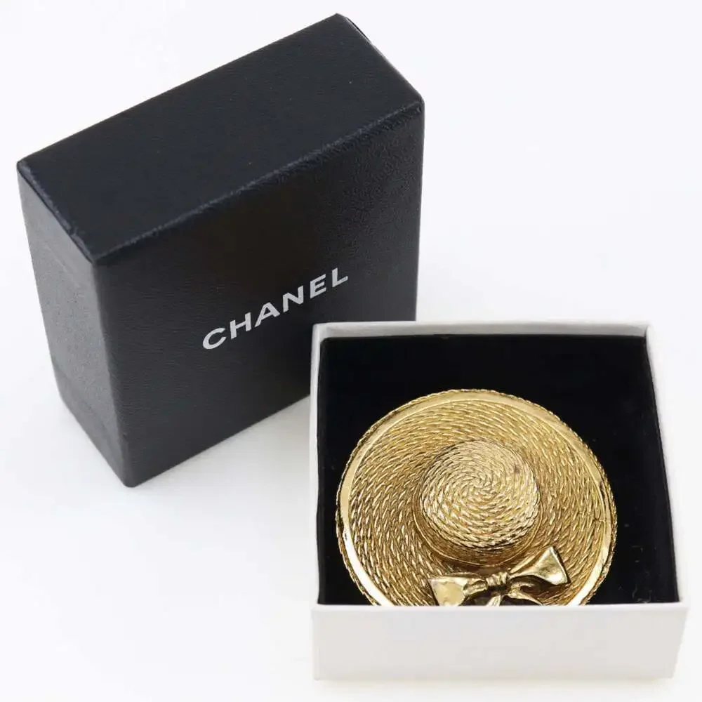 CHANEL Gold Straw Brooch
